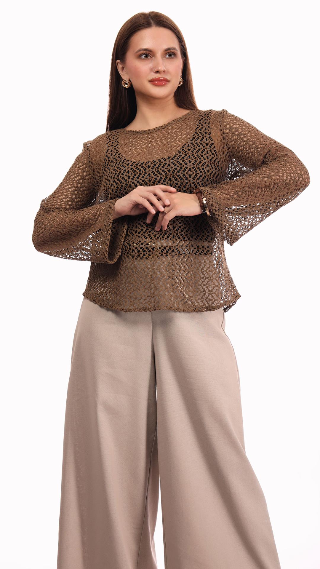 Gilded Allure – Highlighting the embellishments and the elegant charm of the top.